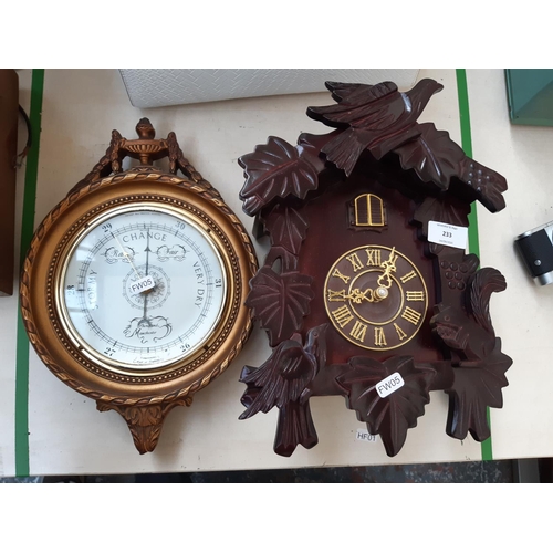 233 - Two items to include a vintage style mahogany effect cased cuckoo clock together with an antique sty... 