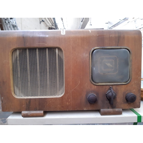 234 - Two vintage valve radios to include a walnut cased Bush and a walnut cased Ever Radio