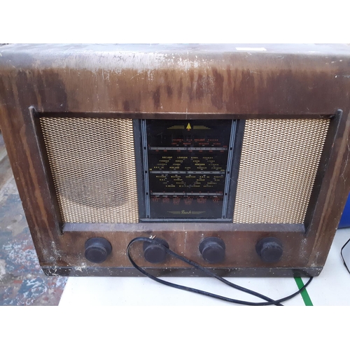 234 - Two vintage valve radios to include a walnut cased Bush and a walnut cased Ever Radio