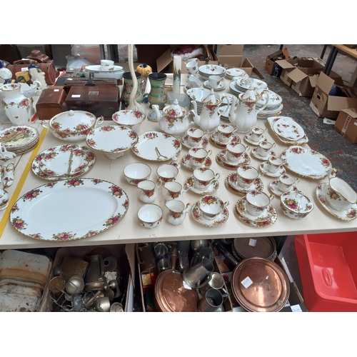 240 - Approximately 52 pieces of Royal Albert ‘Old Country Roses’ dinnerware comprising trios, cake plate,... 