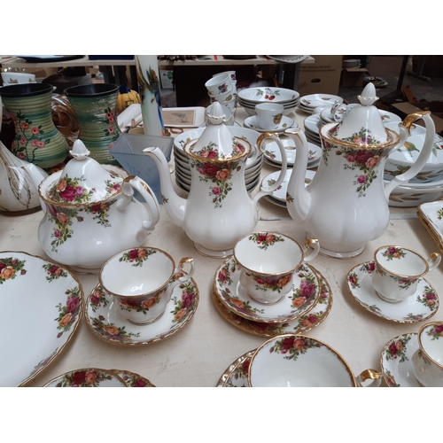 240 - Approximately 52 pieces of Royal Albert ‘Old Country Roses’ dinnerware comprising trios, cake plate,... 