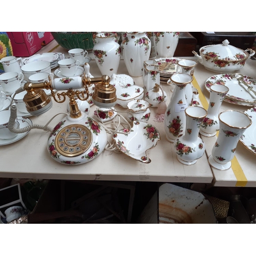 241 - Approximately 31 Royal Albert ‘Old Country Roses’ ornaments to include telephone, vases, trinket box... 