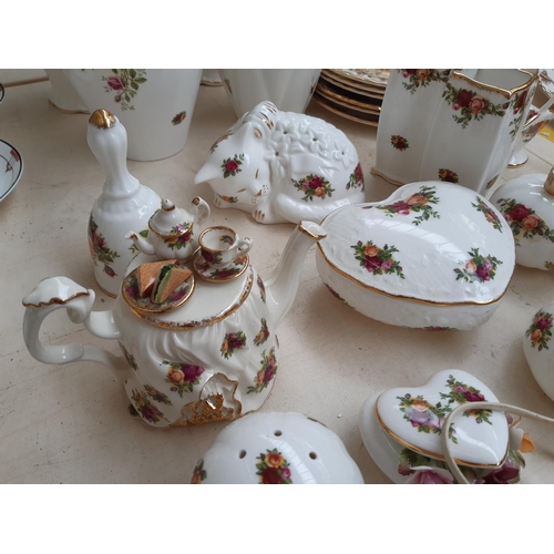 241 - Approximately 31 Royal Albert ‘Old Country Roses’ ornaments to include telephone, vases, trinket box... 