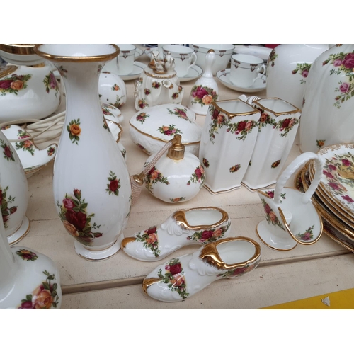 241 - Approximately 31 Royal Albert ‘Old Country Roses’ ornaments to include telephone, vases, trinket box... 