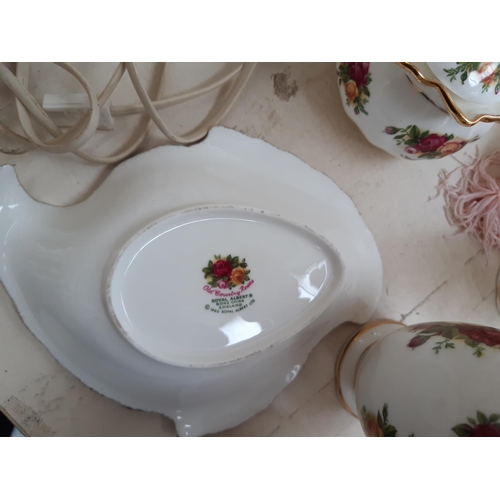 241 - Approximately 31 Royal Albert ‘Old Country Roses’ ornaments to include telephone, vases, trinket box... 