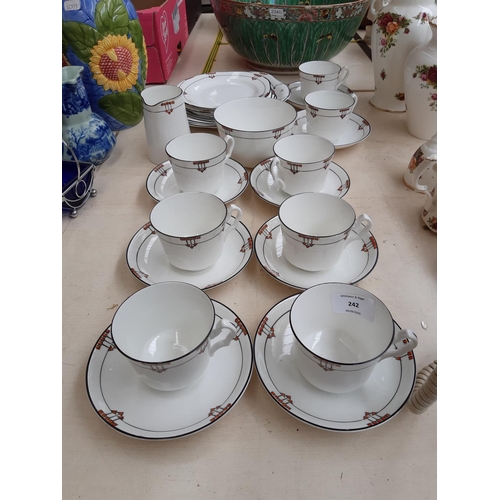 242 - An Art Deco 24 piece hand painted tea set comprising cake plate, tea cups, side plates etc.