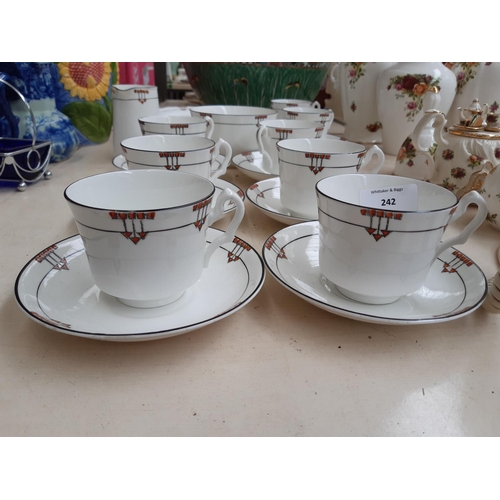 242 - An Art Deco 24 piece hand painted tea set comprising cake plate, tea cups, side plates etc.