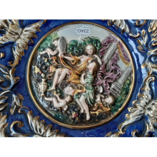 246 - A large Capodimonte porcelain circular charger depicting classical scene together with a Mason's Vis... 