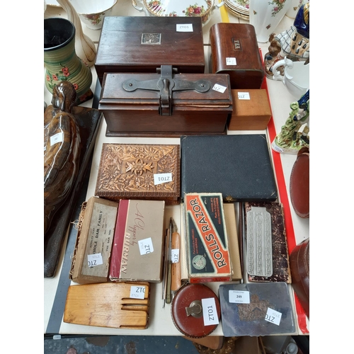 249 - A collection of mixed items to include two Rolls Razors (one boxed), an oak cased tie press, precisi... 