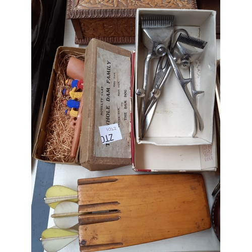 249 - A collection of mixed items to include two Rolls Razors (one boxed), an oak cased tie press, precisi... 