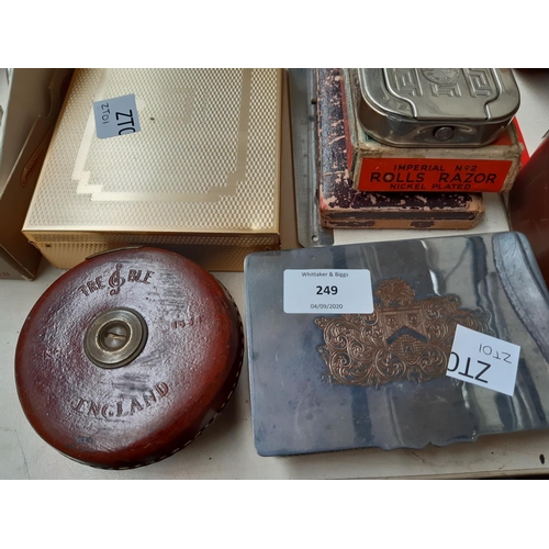 249 - A collection of mixed items to include two Rolls Razors (one boxed), an oak cased tie press, precisi... 