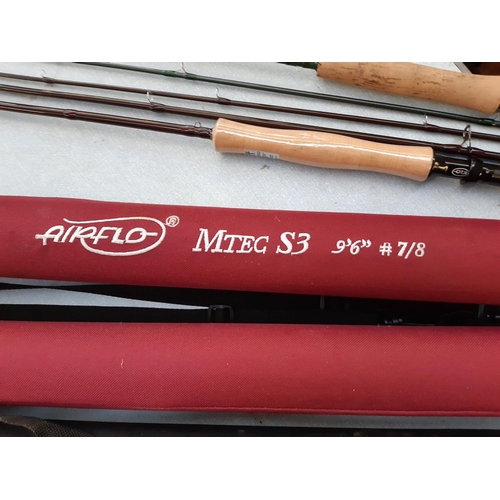 Four various fishing rods to include a Fulling Mill world class FMGX gold  9' four piece fly rod, two