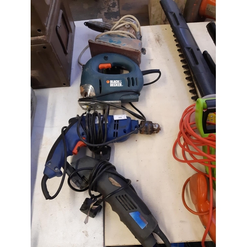 694 - Four electric power tools to include Black & Decker CD301 jigsaw, Draper hammer drill, Black & Decke... 