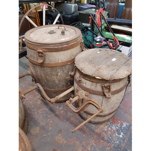 717 - Two vintage wooden butter churns to include one large and one small