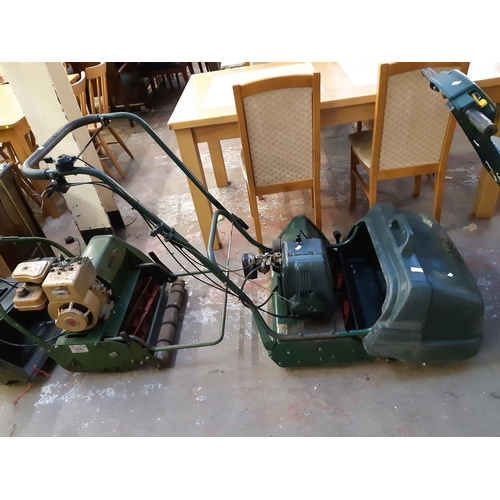 719 - A green Atco Commodore B20 petrol lawn mower with grass collector