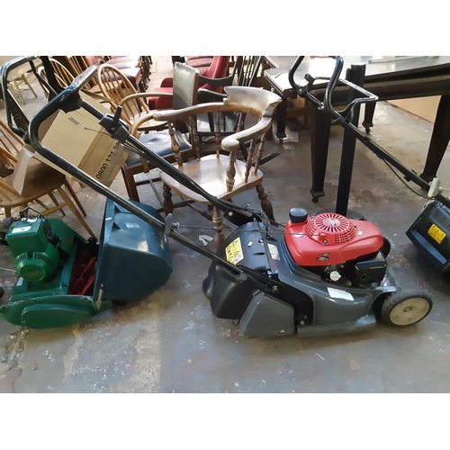 723 - A red and grey Honda HRX 426 petrol lawn mower with easy start engine