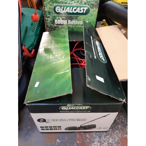 729 - A boxed Qualcast QE32 electric rotary lawn mower (Shop return)