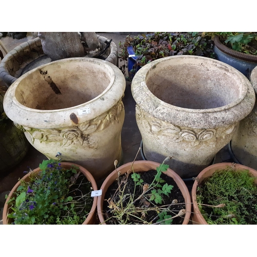 743 - A pair of Willowstone cast stone circular garden planters - measuring approx. 18