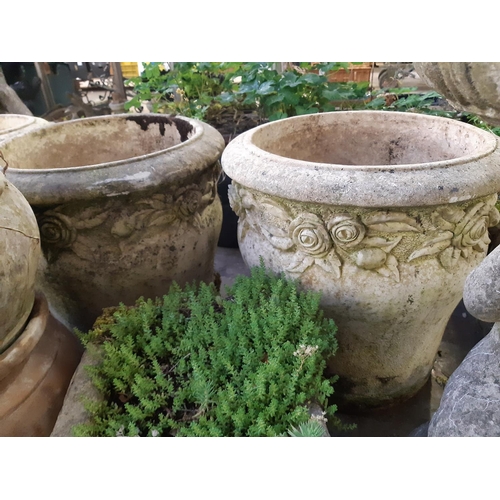 744 - A pair of Willowstone cast stone circular garden planters - measuring approx. 18