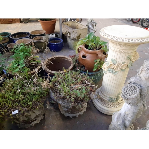 746 - Three items to include two cast stone circular garden planters (measuring approx. 12