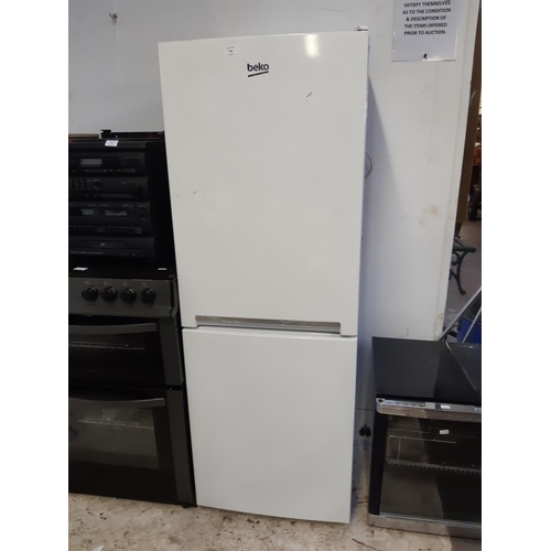 752 - A Beko upright fridge freezer