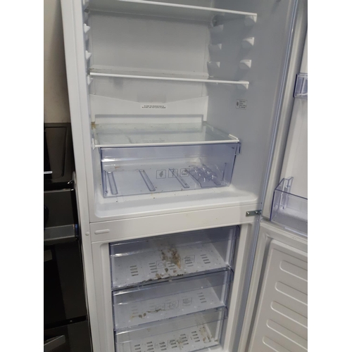 752 - A Beko upright fridge freezer