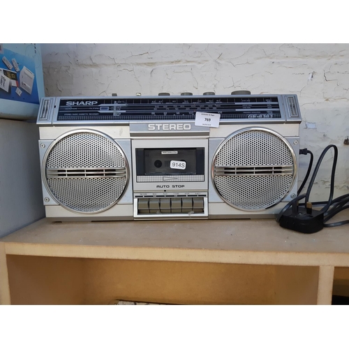 769 - A vintage Sharp GF-4343 portable radio cassette