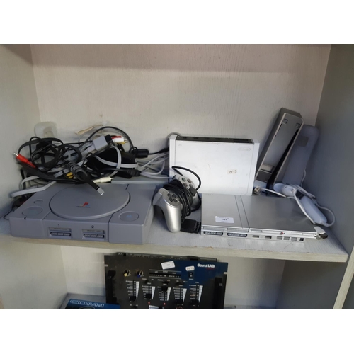 797 - A selection of gaming consoles and accessories to include Sony PS1 and PS2 slimline, Nintendo Wii, l... 