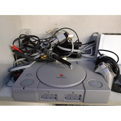 797 - A selection of gaming consoles and accessories to include Sony PS1 and PS2 slimline, Nintendo Wii, l... 