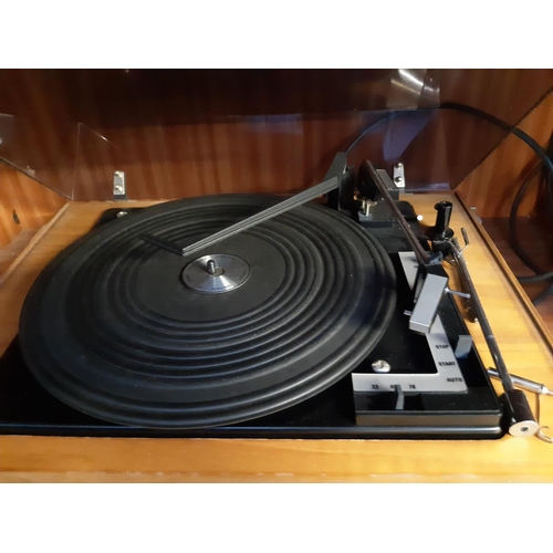 803 - A vintage wooden cased HMV record player with built in amp and radio