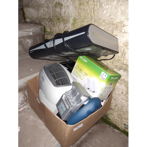 807 - A box containing Sky + HD box, Delonghi heater, boxed Motorola phone, battery charger etc.