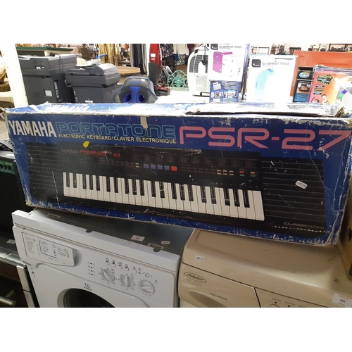 823 - A boxed Yamaha PSR27 electric keyboard