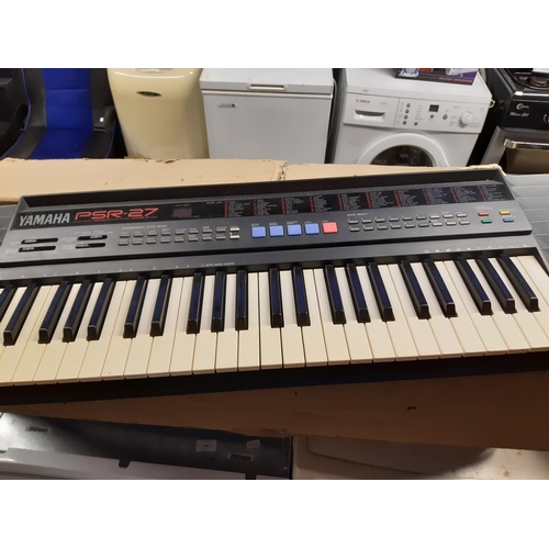 823 - A boxed Yamaha PSR27 electric keyboard