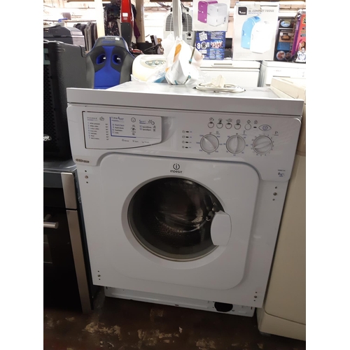 825 - An Indesit IWME126 6kg integrated washing machine