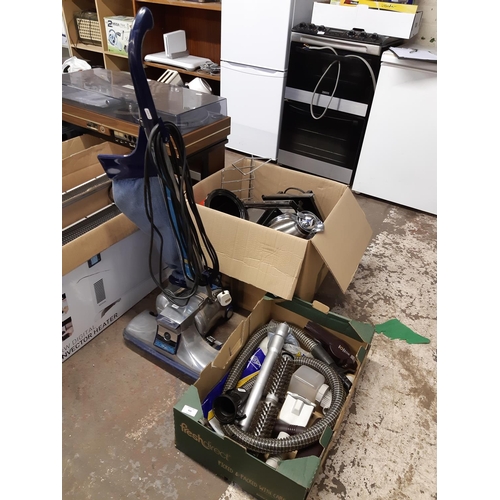 830 - A Kirby industrial vacuum cleaner with boxed accessories