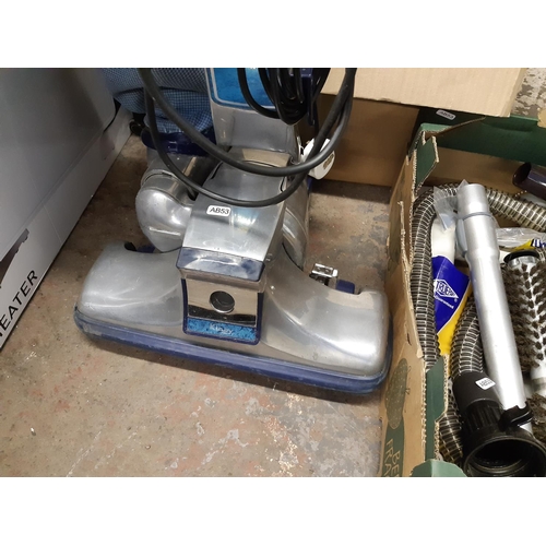 830 - A Kirby industrial vacuum cleaner with boxed accessories