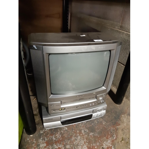 840 - Two items to include an Aiwa VXD1420 14