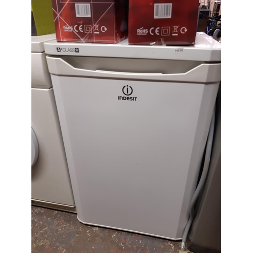 866 - An Indesit A+ class under counter fridge