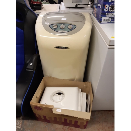 876 - A large Promac PM38CM portable air conditioner and box of fittings