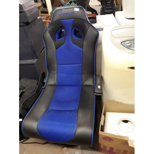 877 - A black and blue Rocker adrenaline gaming chair