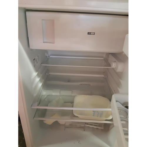 887 - A Beko A+ class under counter fridge