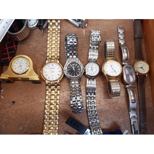 59A - A box containing a large quantity of various ladies wrist watches to include Berge, Badavici etc.