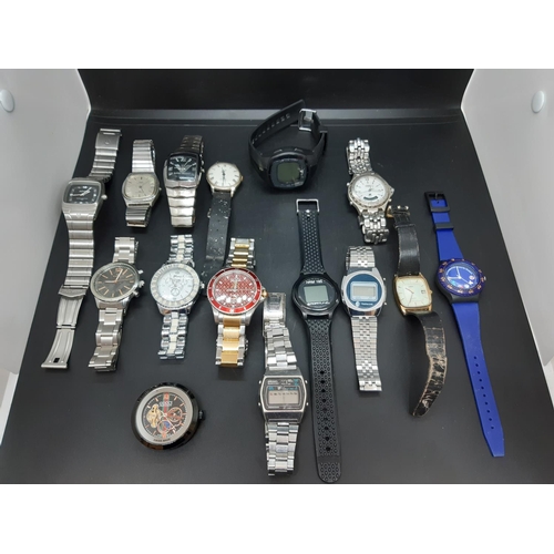 59B - A box containing a collection of gents wrist watches to include Vialli, Penguin, Armani style etc.