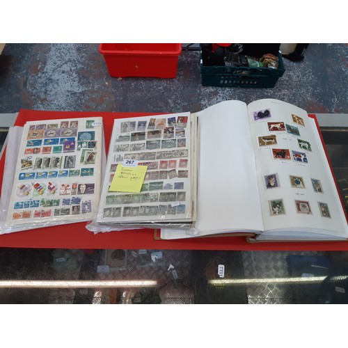 99A - A stamp collection to include an album containing stamps of the world to include Afghanistan, Albani... 