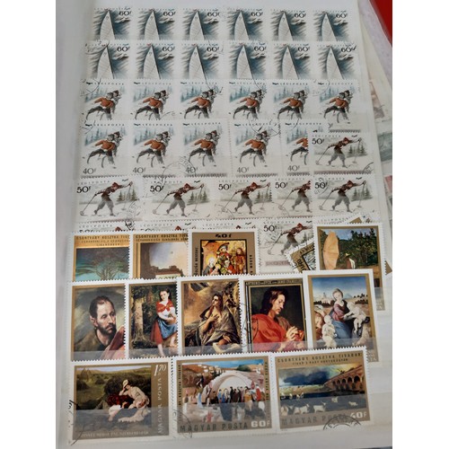 99A - A stamp collection to include an album containing stamps of the world to include Afghanistan, Albani... 