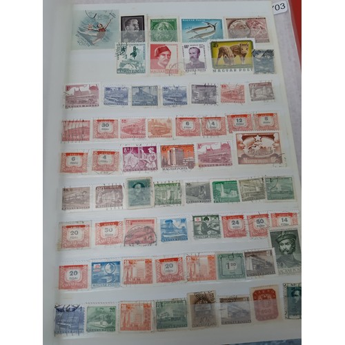 99A - A stamp collection to include an album containing stamps of the world to include Afghanistan, Albani... 