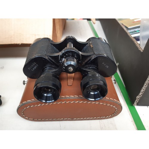 206 - Four pairs of vintage cased binoculars to include a pair of Hunter model 711 8x30, Titan 10 X 50, El... 