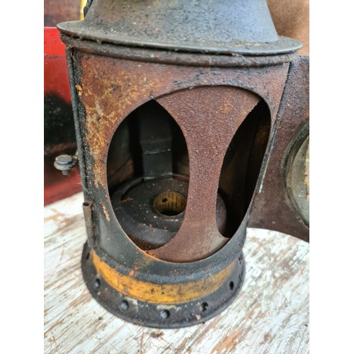 190 - An early/mid 20th century black painted B.R (W) railway signal lamp together with A mid 20th century... 