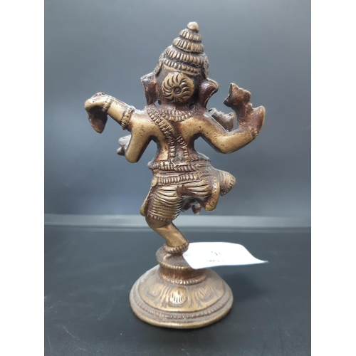 16 - A cast bronze figurine of the Hindu elephant god ‘Ganesha’ - measuring approx. 11cm in height