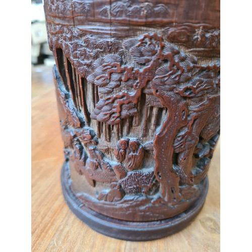 24 - A 19th century chinese hand carved 3 dimensional bamboo shoot brush pot with garden, mountain and fi... 